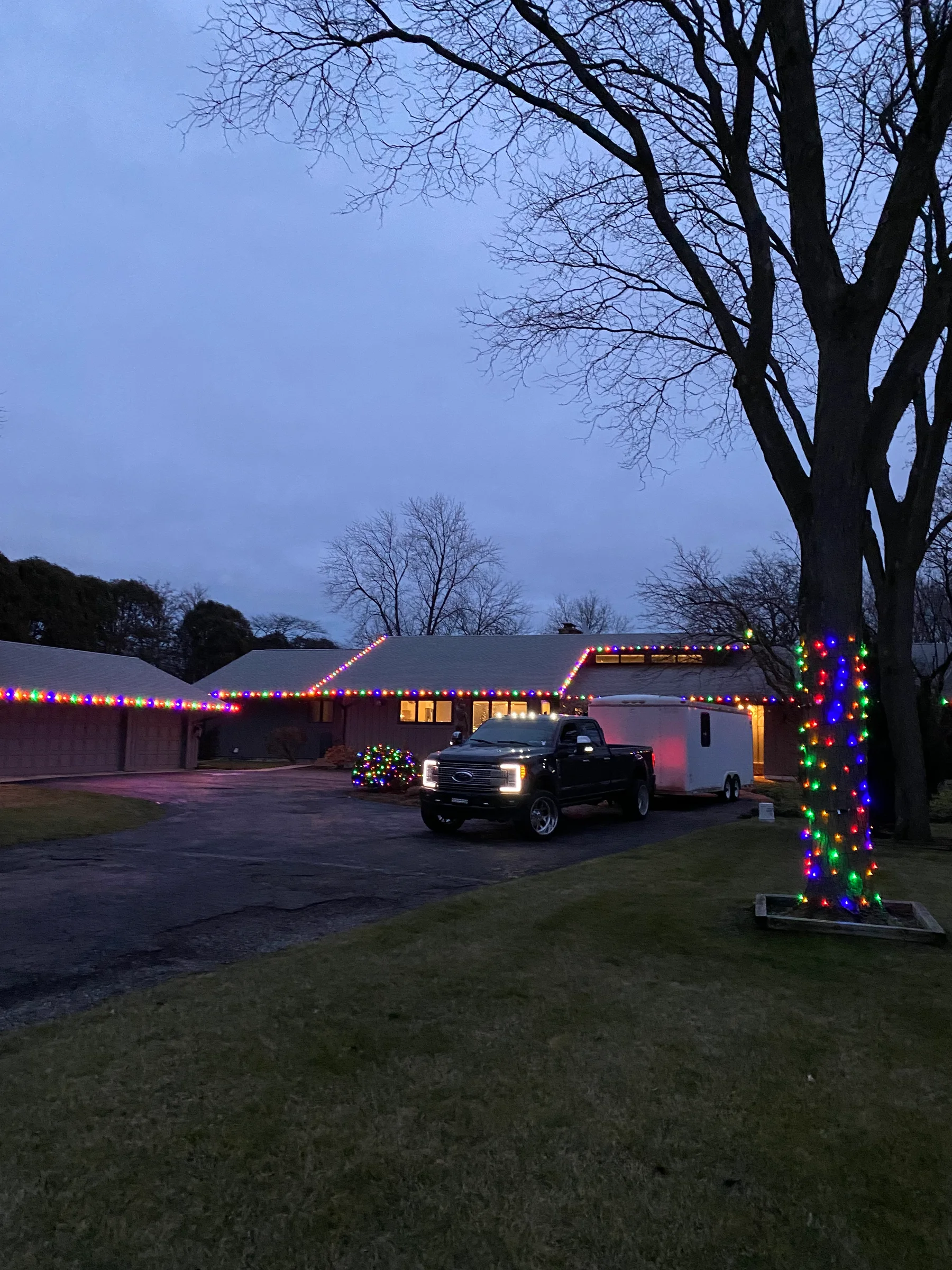 Michigan residence outlined with bright seasonal roofline lights