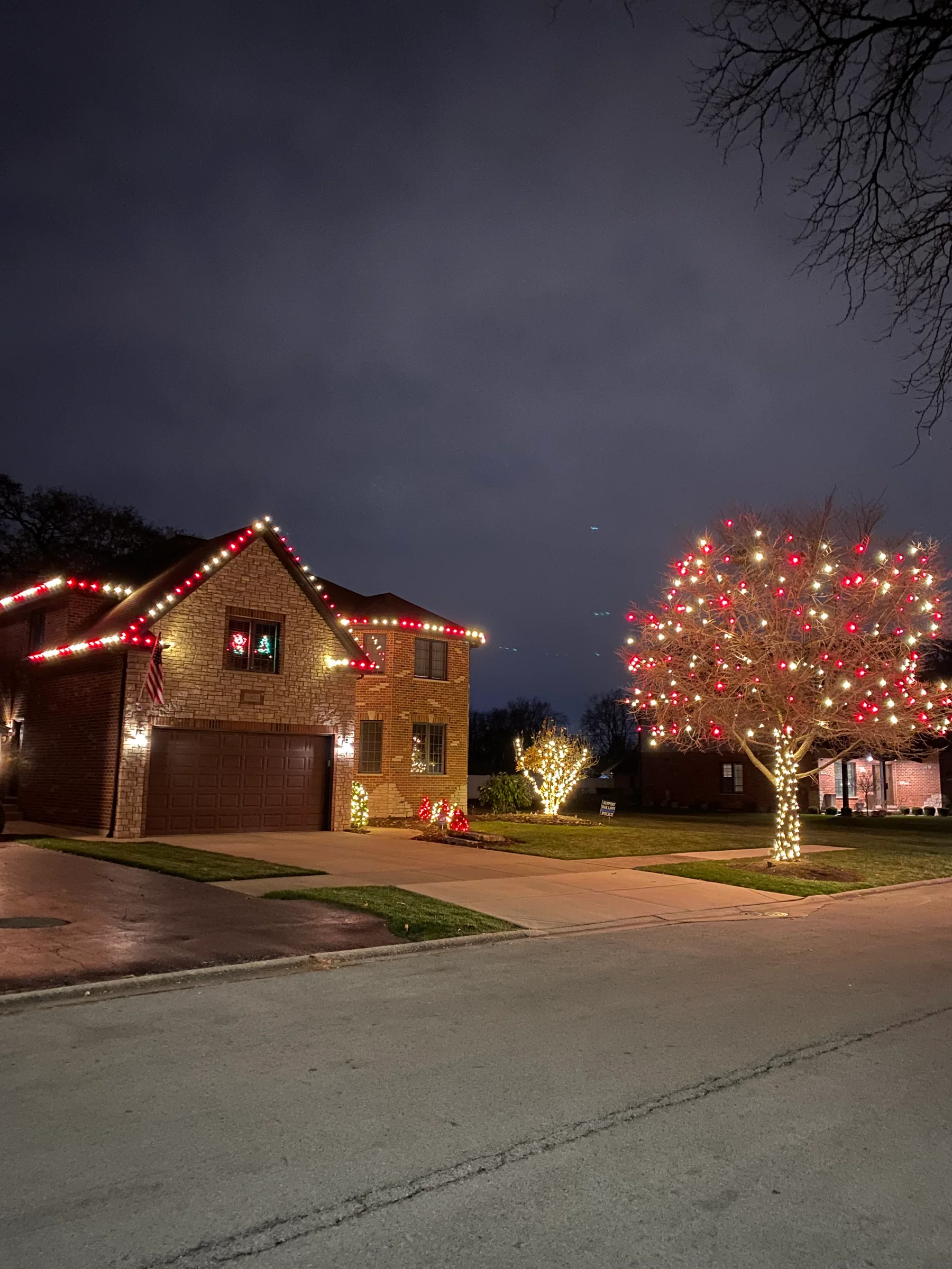 Christmas lights illuminating a West Michigan residence